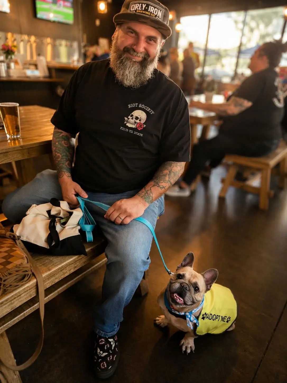 Marc with a foster pup at an adoption event.